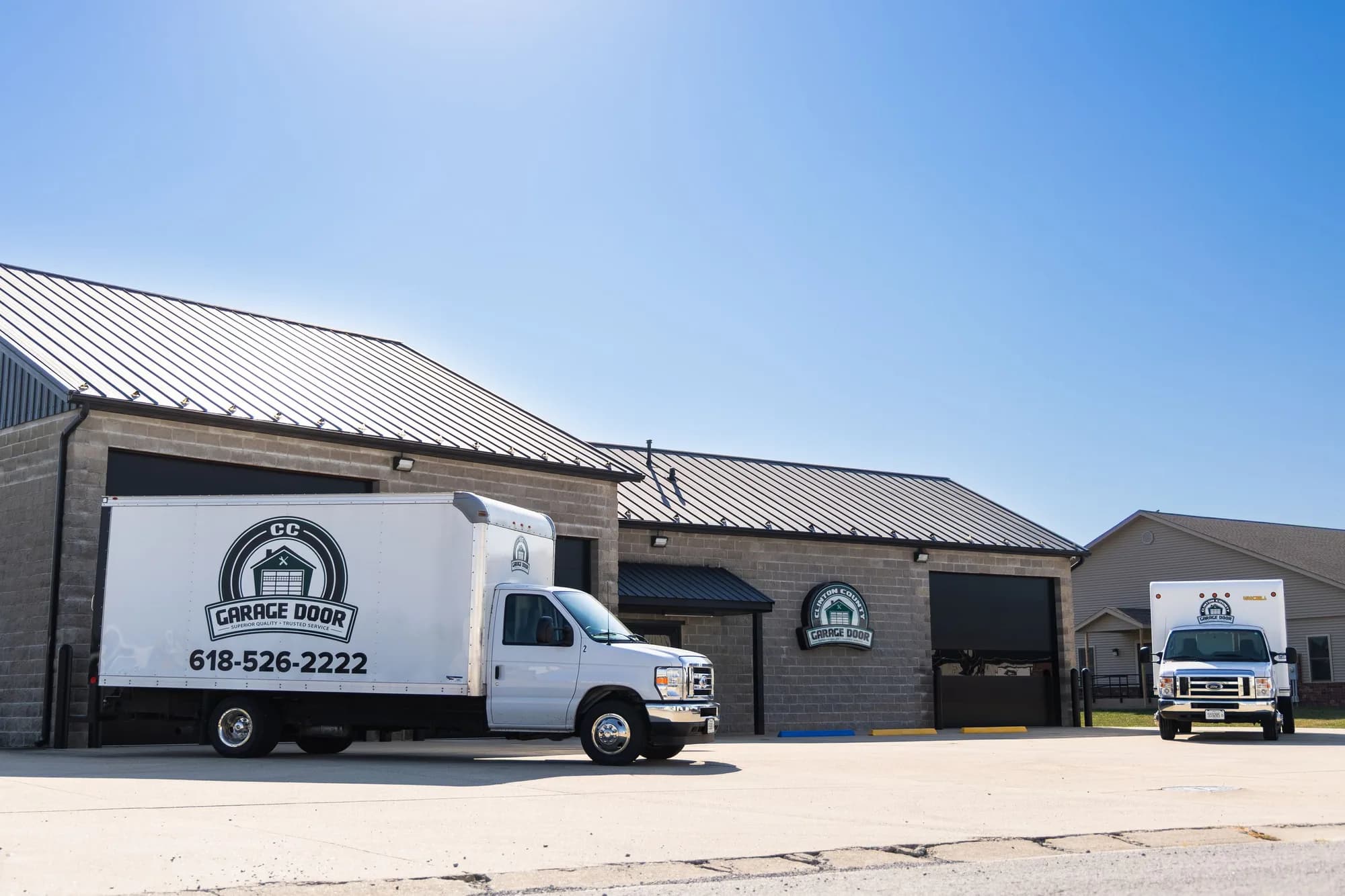 CC Garage Door box truck parked in front of the Aviston shop