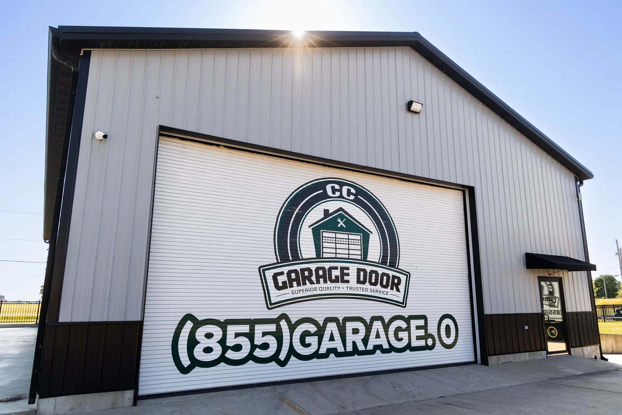 Warehouse rolling door at the Aviston shop printed with the CC Garage Door logo